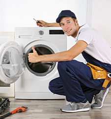 Verified TKN Experts technician repairing an appliance in Bangalore